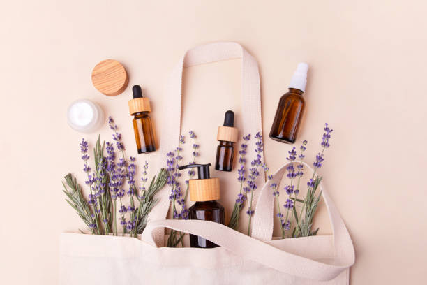 istock Open eco friendly cotton reusable bag with the different containers.Pastel colors.Natural lavender around.Concept of organic,zero waste cosmetics.Woman bag with accessories. 1428997785