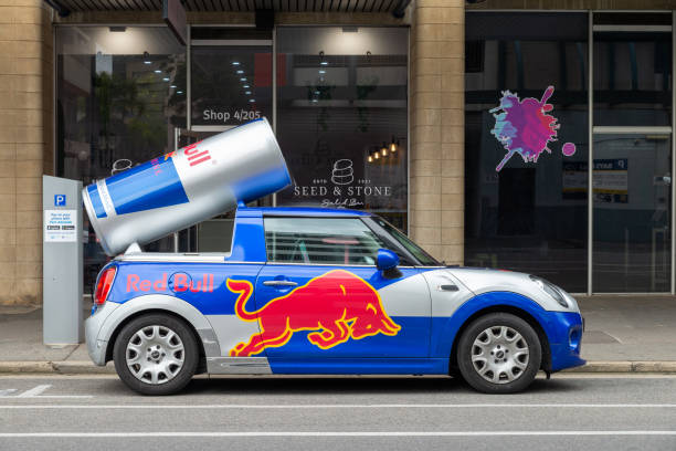 Red Bull branded Mini Cooper parked in front of the store in Adelaide CBD, South Australia Adelaide, Australia - September 02, 2022: Red Bull branded Mini Cooper parked in front of the store in Adelaide CBD, South Australia red bull mini stock pictures, royalty-free photos & images