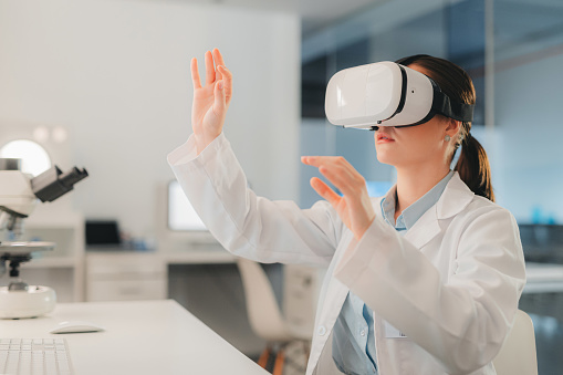 Vr, research and science with woman in laboratory working on medical innovation with augmented reality, 3d and metaverse. Futuristic, technology and virtual reality with scientist in biotechnology