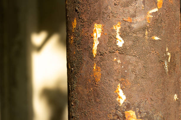 istock Photo old rusty pipe pole with the remains 1429006225