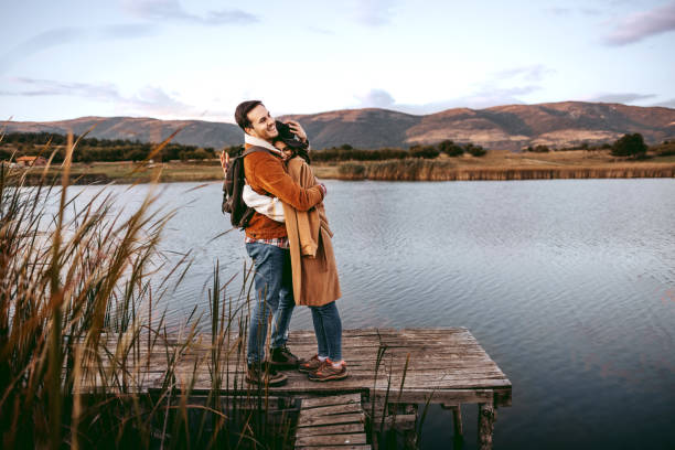 istock Young romantic couple standing on the pier 1429017316