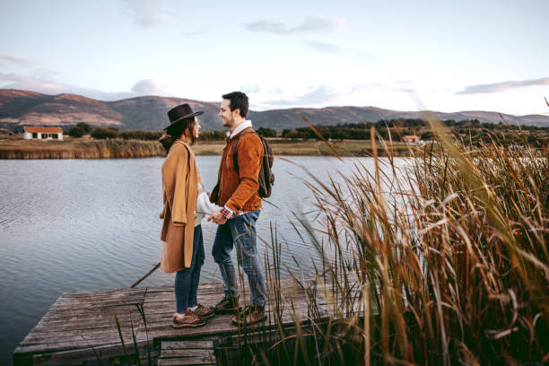 istock Young romantic couple standing on the pier 1429017319