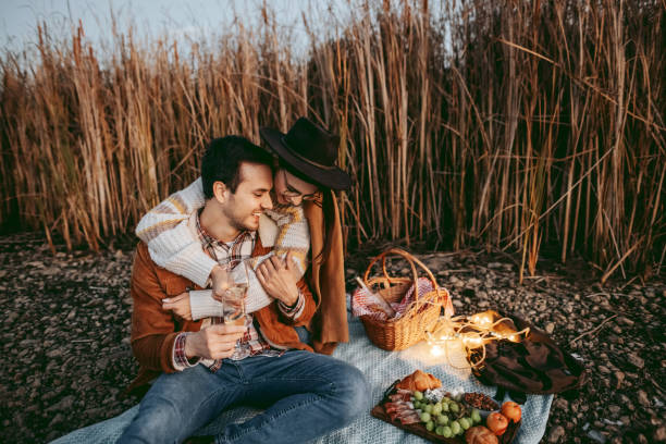 istock Beautiful young couple enjoying picnic time 1429017924