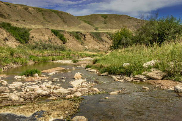 istock Bridge and creek leading into town Heskith Alberta Canada 1429020844