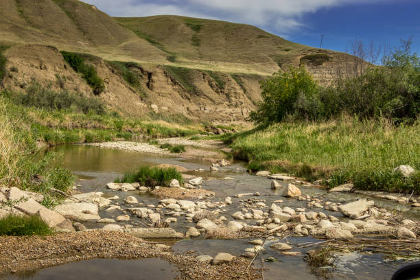 istock Bridge and creek leading into town Heskith Alberta Canada 1429021614