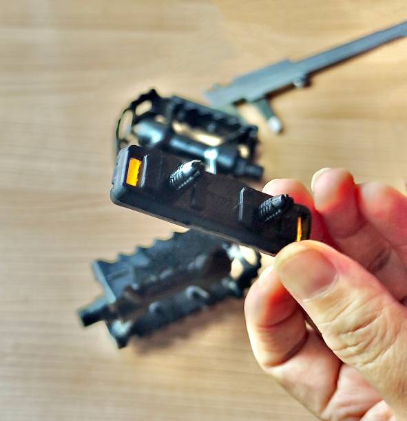 istock Hand Holding Broken Mountain Bicycle Pedal 1429023246