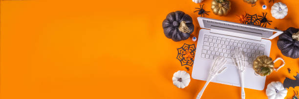 istock Halloween office laptop background 1429024755