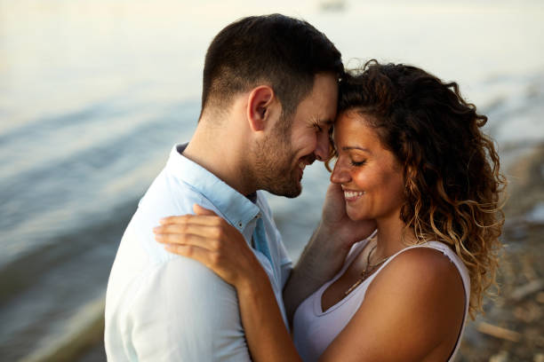 istock Couple in love by the river 1429027189