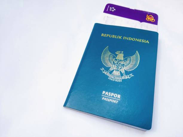 istock Passport and ticket on broken white background 1429029133