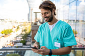 istock Medical worker using mobile phone 1429029871