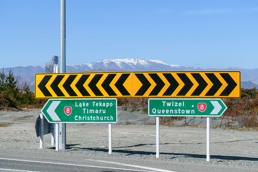 The junction on State Road 8 leading to Aoraki Mount Cook in the Southern Alps.  This image was taken on a sunny afternoon in early Spring.