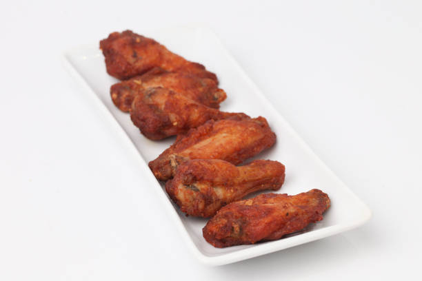 Fried Chicken Wings with sesame isolated on white