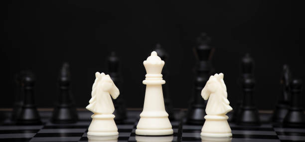 istock Business strategy competitive ideas concept with chess board game.Business competition, Fighting and confronting problems, threats from surrounding problems. Exhibited under the concept of games. 1429041978
