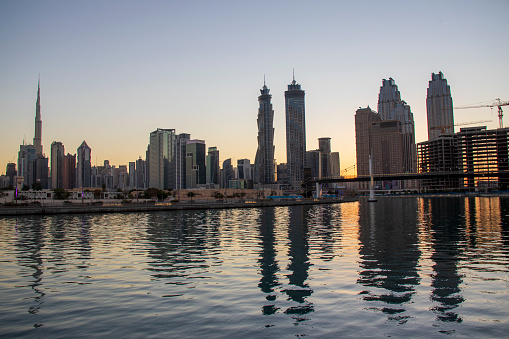 Dubai, UAE - 01.08.2021 View of the Dubai city skyline at Dubai Water Canal. Business Bay district.