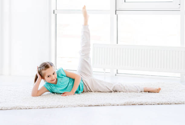 istock Little girl doing workout 1429046644