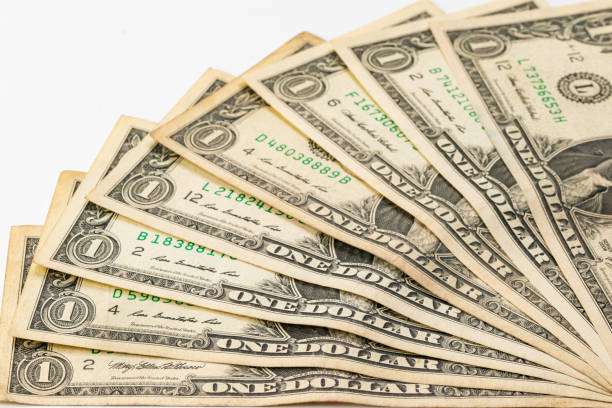 istock Closeup view of used one american dollar bills. 1429046801