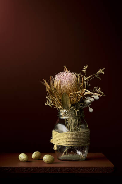istock Dried protea flower arrangement in glass pot 1429053214