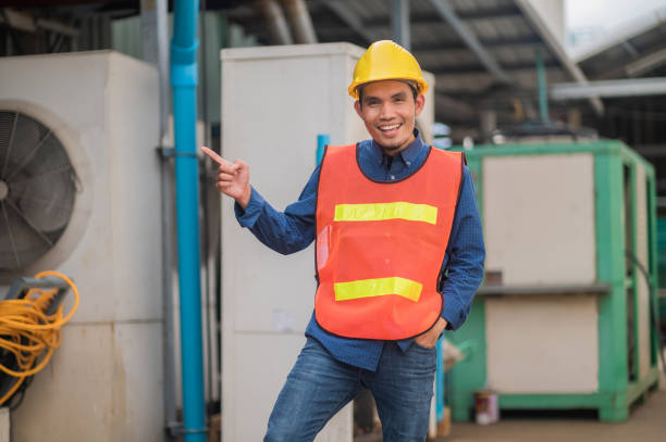 istock Asian man worker standing at machine in factory, Engineer factory concept 1429054610