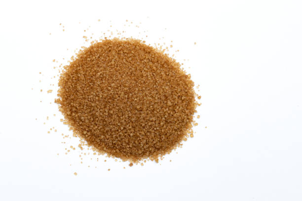 istock pile of cane sugar isolated on white background 1429059141