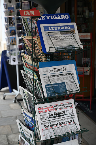 Ajaccio, september 29, 2022 : French newspapers on the display of a press store