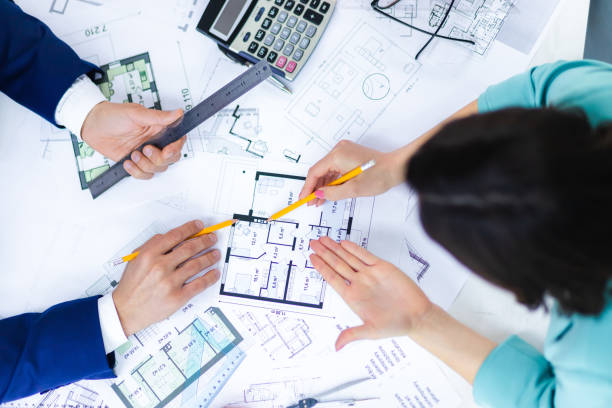 istock Close up photo of hands working with papers at office. 1429061131
