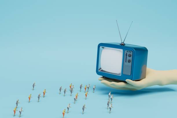 istock television propaganda. hand with an old TV with an antenna around which people. 3d render 1429062727