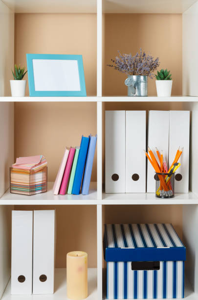 istock File folders, standing on the shelves at office 1429064742