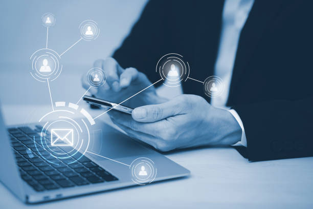 istock Businessman hand pressing the keyboard for sending the e-mail from the laptop computer, Email and SMS marketing concept. Scheme of direct sales in business. List of clients for mailing. 1429066990