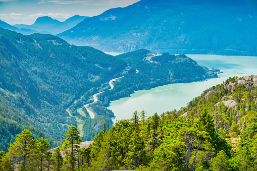 The winding Sea to Sky Highway as seen from Stawamus Chief Mountain in Squamish, British Columbia, Canada