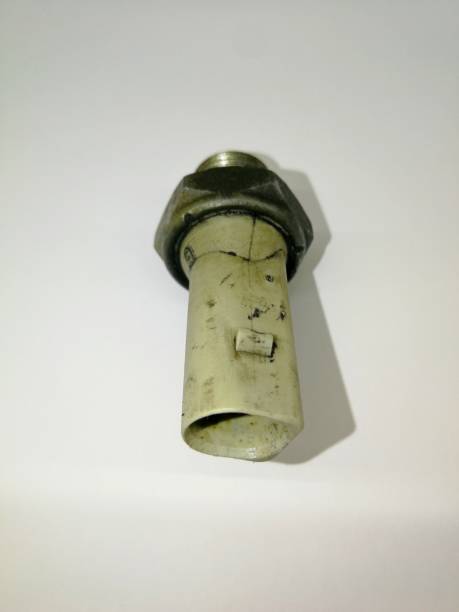 istock Automotive oil pressure sensor, old and dirty, front view 1429072476