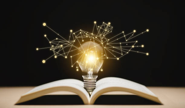 istock Thinking and creative concept, Light bulb on the Book and light bulb style bokeh vintage dark background,Concept The idea of reading books, knowledge, and searching for new ideas. 1429073616