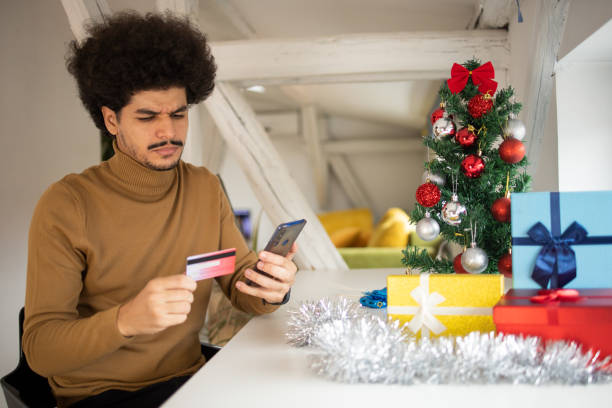 istock Man celebrating Christmas Eve at home 1429074356