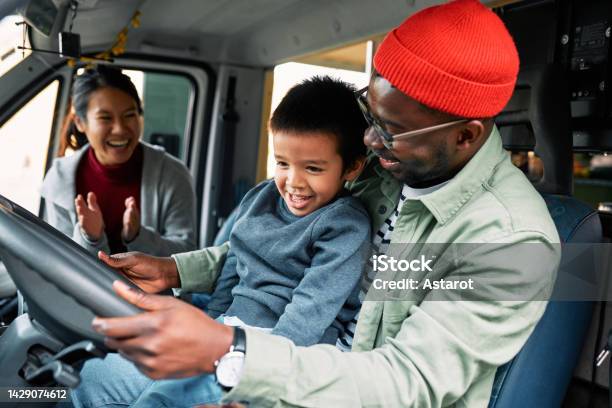 A Nomadic Family Travels In Their Motorhome Stock Photo - Download Image Now - Adult, Adventure, African Ethnicity