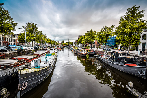 Abundance Of Yachts And Boats Moored In Groningen Canal, The Netherlands