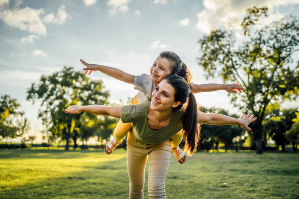 Mom playing with her daughter