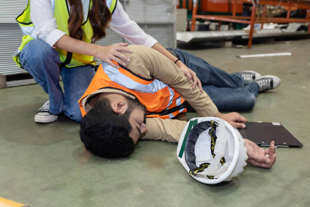 istock Unconscious Asian Engineer Worker Getting First Aids Help From His College 1429088025