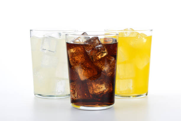 istock Glasses with soft drinks of cola, orange and lemon 1429088987