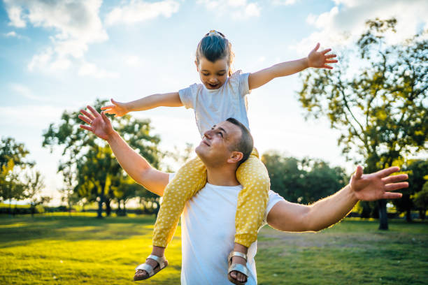 istock Father and daughter in the park 1429089085