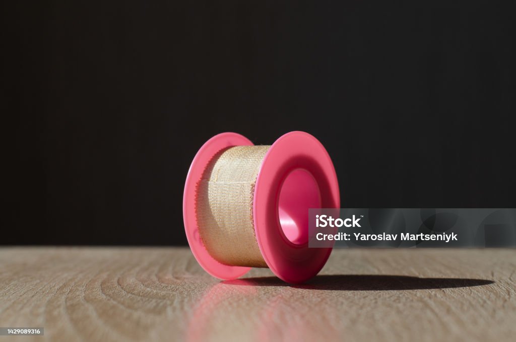 Plastic Spool With Patch Medical Antibacterial Patch And Glue Dressing Scotch  Medical Equipment Stock Photo - Download Image Now - iStock