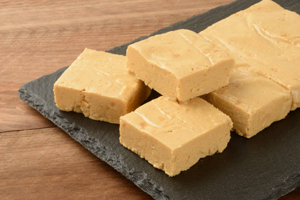 istock Soft nougat cut on a black plate 1429090897