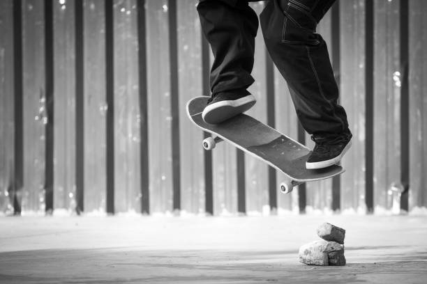 istock Skateboarder jumping obstacles made of bricks and stones 1429096418