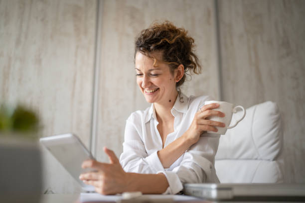 istock One woman working in the office and talk online using digital tablet 1429102285