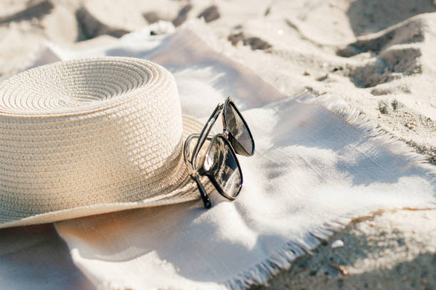 istock Straw beach hat with brim for sun protection with glasses 1429107980