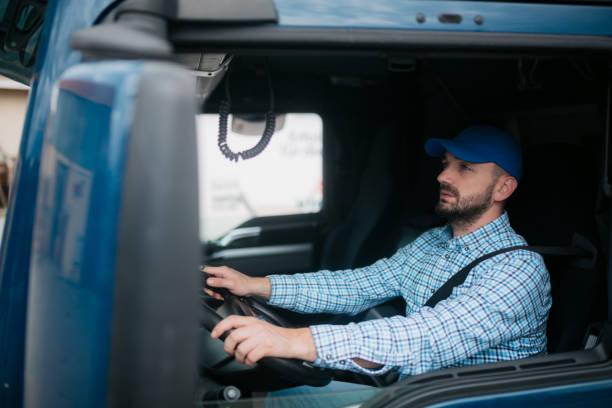 istock Truck driver driving his truck 1429114002