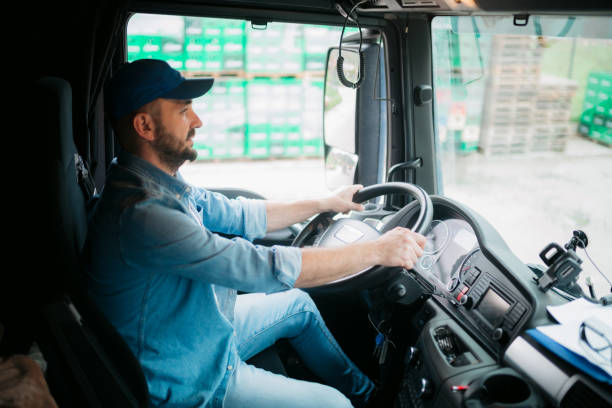 istock Truck driver driving his truck 1429114726