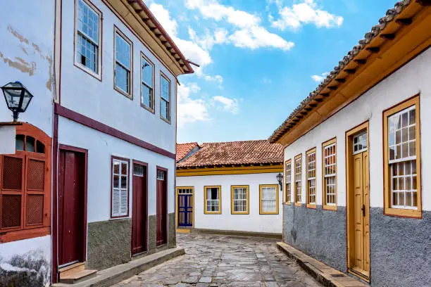 Street with cobblestones and houses with colonial architecture in the old and historic city of Diamantina in Minas Gerais, Brazil