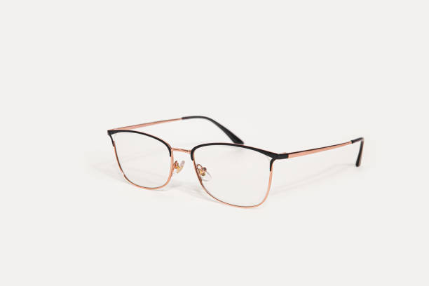 istock Stylish gold  eyeglasses isolated on white background perspective view 1429123015
