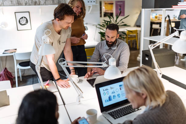 istock Millennial investors in open space office working together and creating innovative start-up business 1429125220