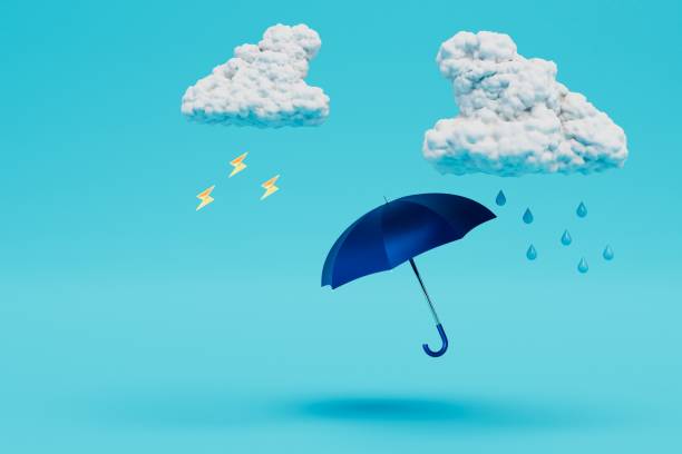 istock rainy weather. clouds with rain and an umbrella on a blue background. cpy paste, copy space. 3d render 1429125394