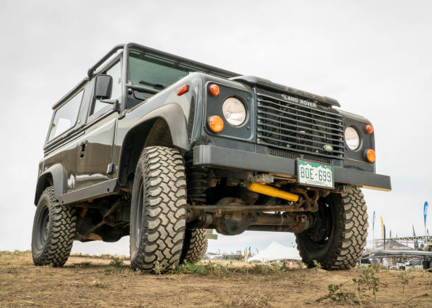 Loveland, CO, USA - August 26, 2022: Low front view of classic Land Rover Defender V8 off-road vehicle.